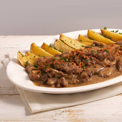 Braised Beef with Garlic Gravy and Potato Wedges