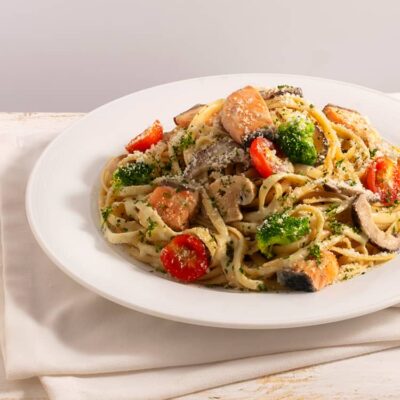 Salmon, Broccoli and Fresh Mushroom Linguini In Pesto Cream Sauce